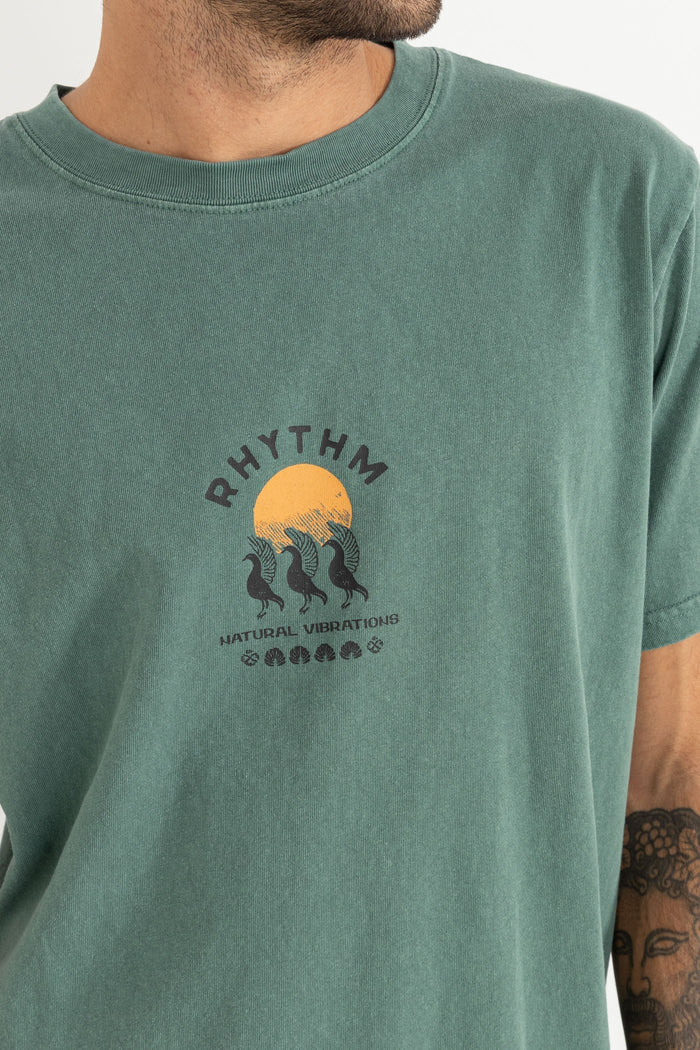 The Natural Vibrations Vintage SS T-Shirt in Vintage Green features screen print artwork, a 1x1 rib knit neck band, and Rhythm’s signature trims. Washed and dyed for a vintage look and feel.