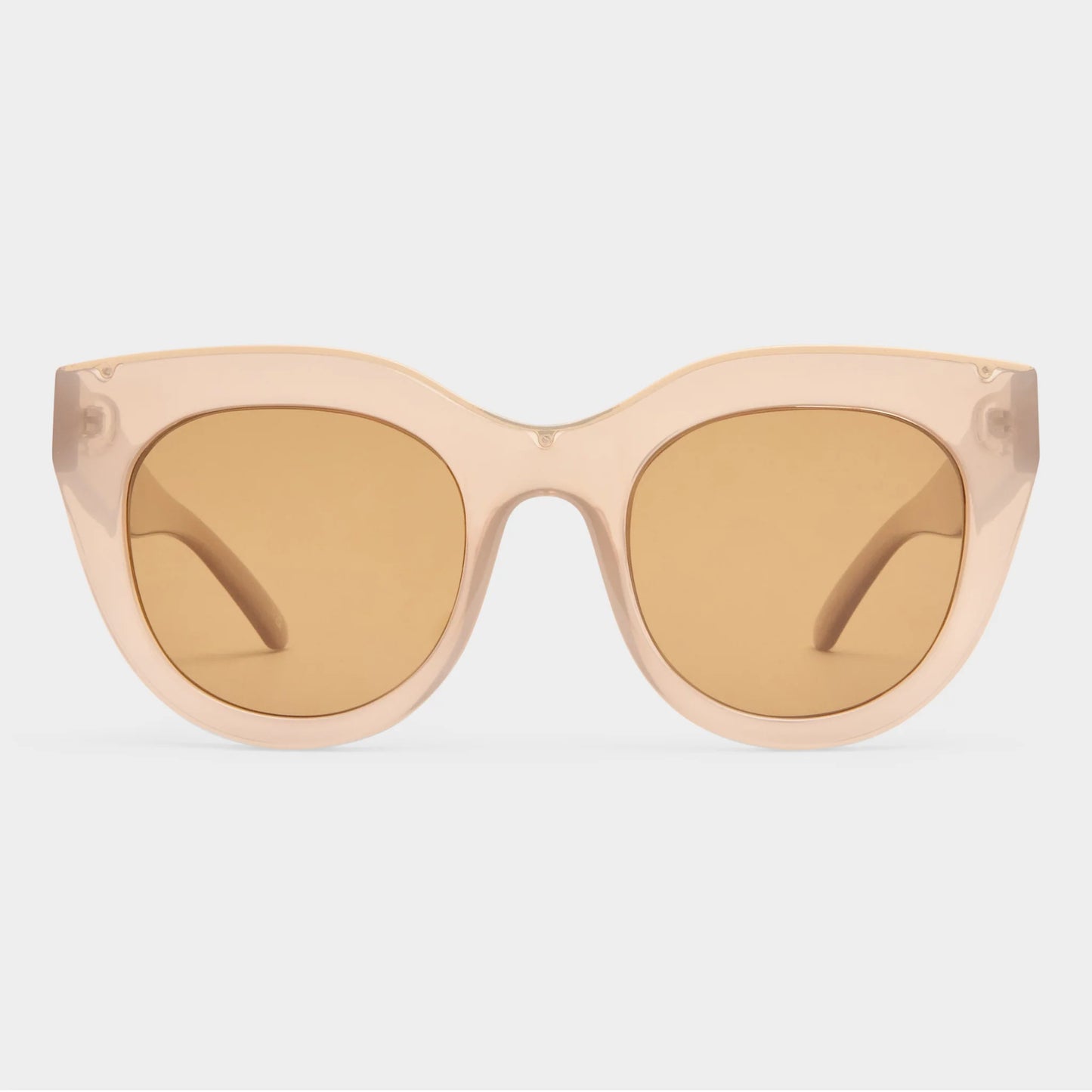 A favourite of Meghan Markle and Olivia Palermo, the AIR HEART silhouette is an iconic Le Specs style. With oversized and dramatic proportions reminiscent of a cat eye, the style is designed with a thick semi-translucent tan frame and luxurious metal top bar inlay, then fitted with premium zero base smoke flat lenses. The perfect statement sunglass to suit all face shapes.