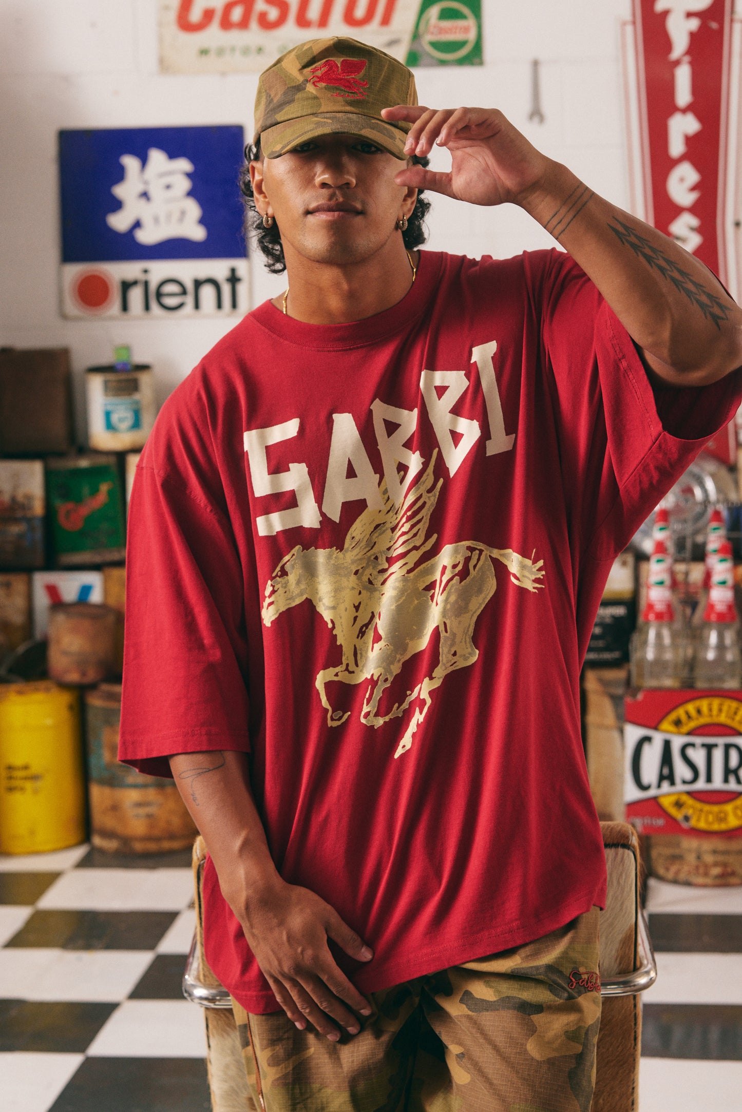 The Very Oversized Rhinestone Tee – RED
Crank up the attitude with the Very Oversized Rhinestone Tee in Red. Featuring a fierce blue winged stallion print and bold “SABBI” branding across the front, this tee brings major rock ‘n’ roll energy. Crafted from soft cotton in an ultra-roomy fit, it's made for lounging, layering, or leading the pack.