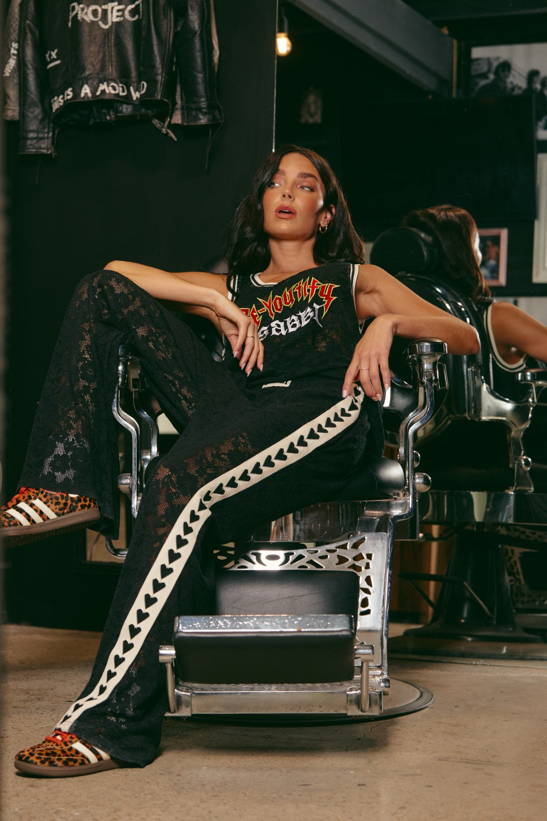Make a statement in The Raving Hearts Lace Pants - Black, where grunge meets goddess. Crafted from soft, floral lace with a sheer finish, these pants embody the perfect clash of romance and rock ‘n’ roll. The relaxed, wide-leg silhouette flows effortlessly while the contrast heart trim running down each leg adds a bold, playful twist.