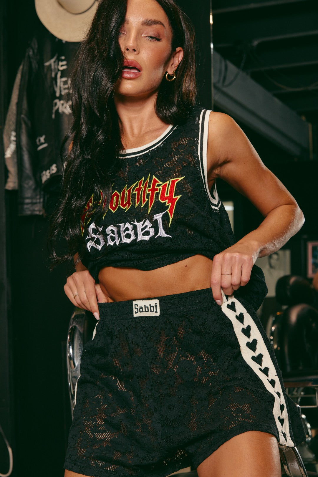 Turn up the heat with The Mini Hearts Lace Shorts - Black, where delicate femininity meets street-style rebellion. Crafted from intricate black floral lace, these statement shorts blend luxe texture with a playful edge — made to move with confidence from lounge to late night.