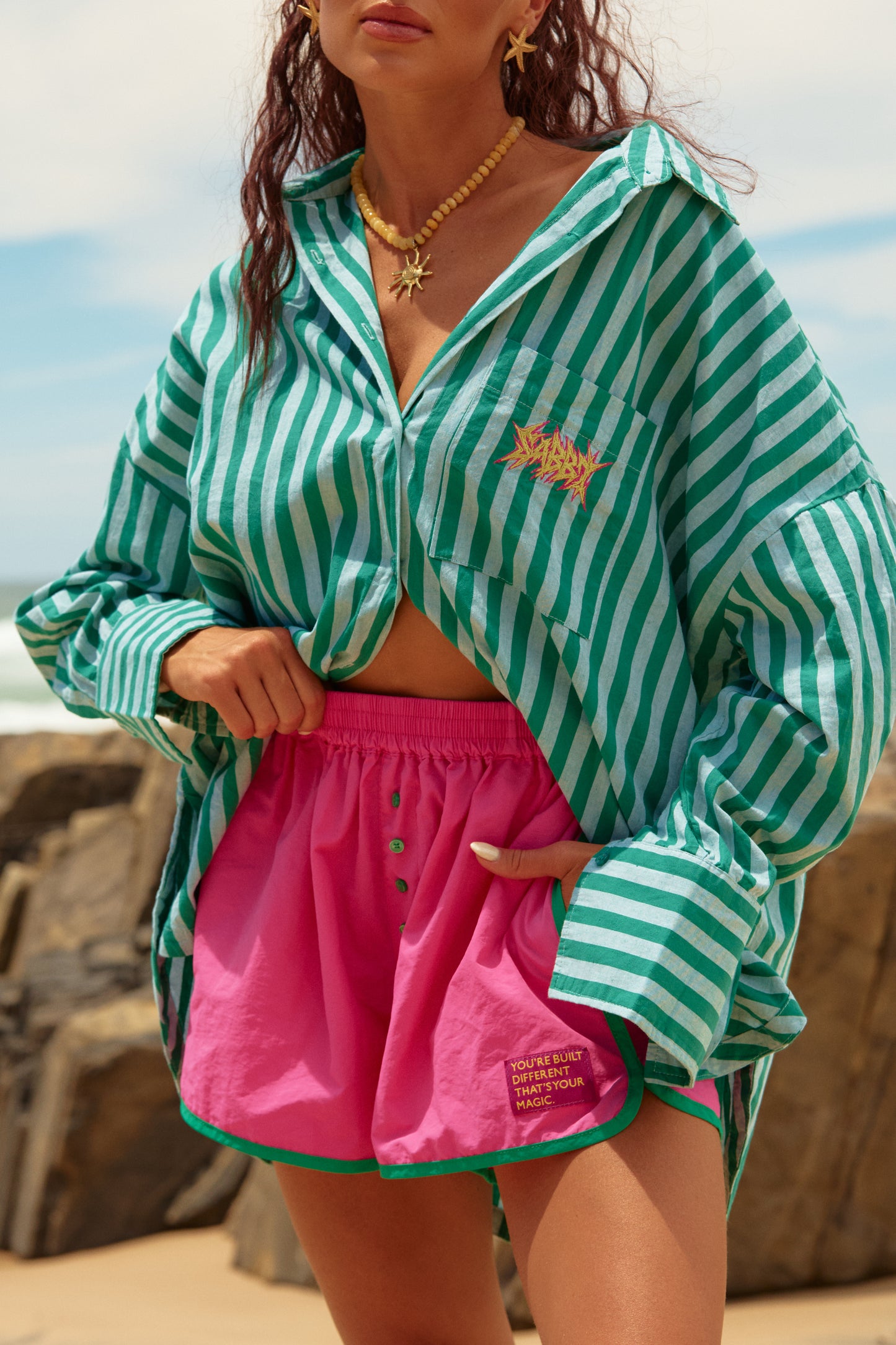 Sabbi - Meet your new off-duty essential. The Board Short – Pink is designed for salty days, golden hours and everything in between. Cut in a relaxed, easy fit with a soft elastic waistband, these shorts are all about comfort without sacrificing style. The vibrant pink hue pops against sun-kissed skin, finished with contrast binding and signature Sabbi details for that extra hit of personality.