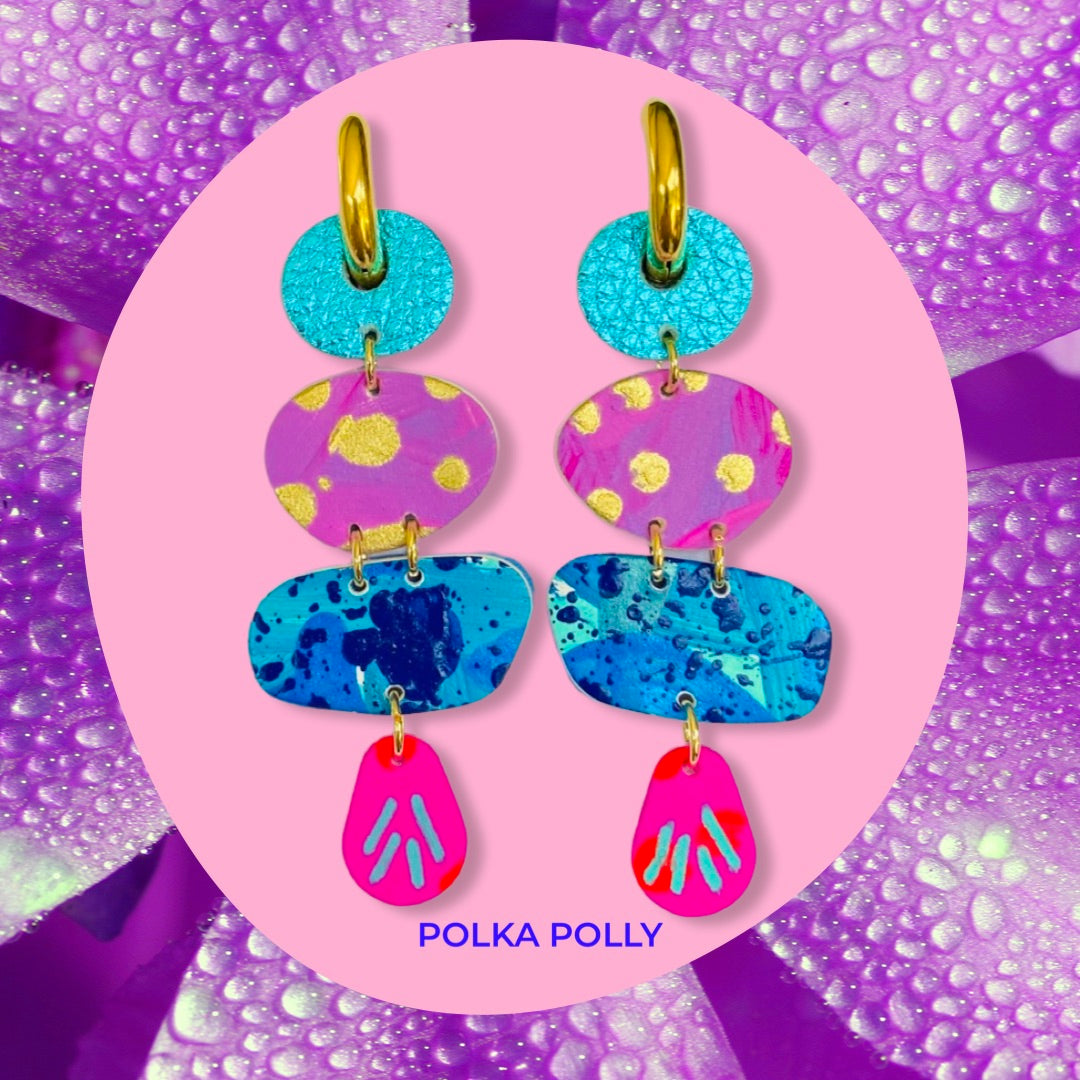 Featuring a complementary mix of metallics and hand painted leather beads in bright pinks, blues, purples and gold – set on golden stainless steel chunky hoops.