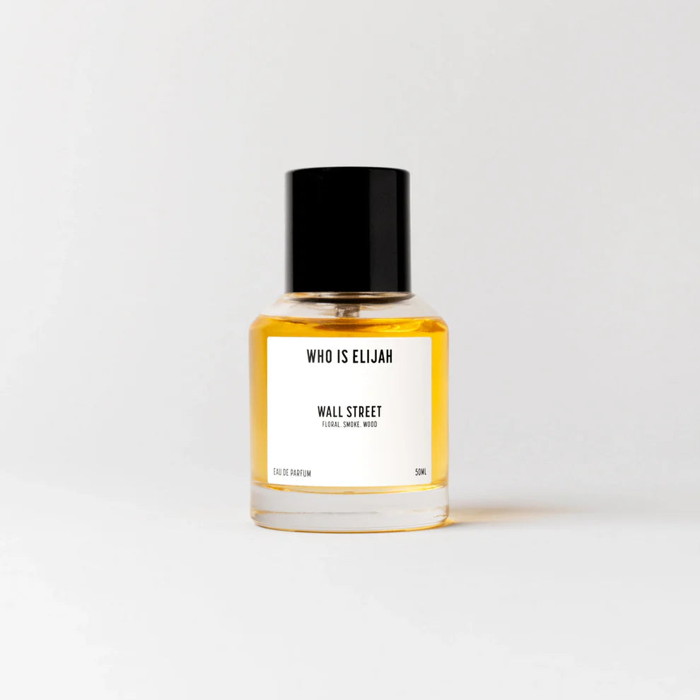 WALL STREET is for the one who understands the art of subtle seduction. It’s a fragrance that doesn’t scream for attention, it simply demands it. Sophisticated, yet daring, it lingers in the air, leaving a trail of undeniable allure.
The opening is an unexpected dance of rose and raspberry, sweet yet sharp, like a secret whispered in the ear. It’s an invitation, a promise of something more, full of intrigue and desire.
As WALL STREET evolves, the richness of oud, saffron, and smoky wood dee