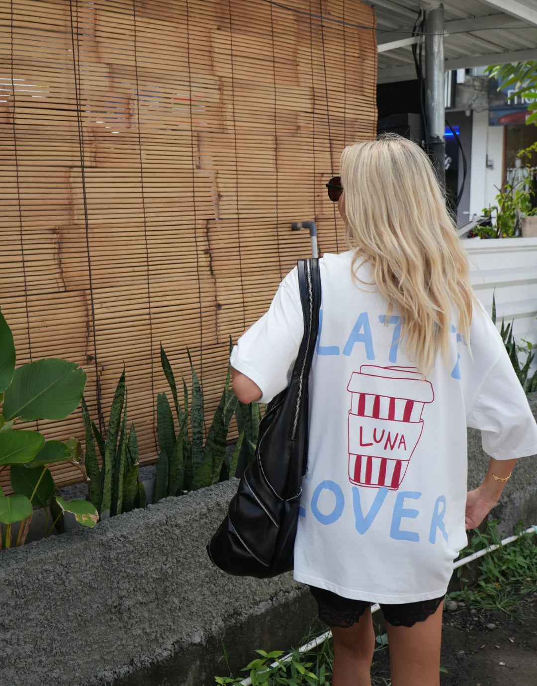 Made from 100% cotton in crisp white fabric, The Latte Tee is your go-to everyday staple. Featuring a unisex oversized fit, it’s soft, breathable, and effortlessly versatile. Perfect for layering or wearing on its own, this tee delivers comfort and style in equal measure.