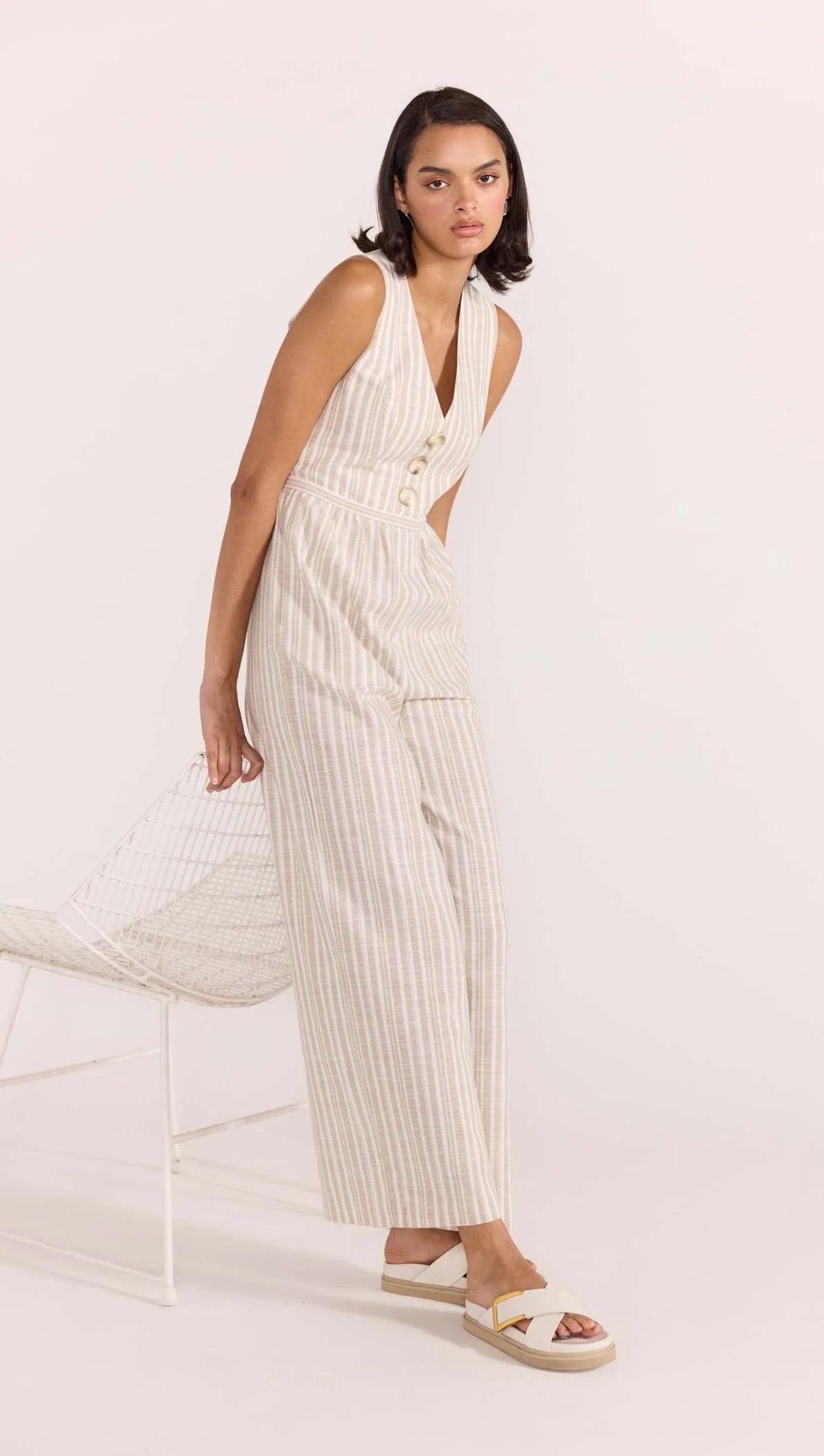 Embrace those warmer months with this on trend striped peace, the Edra Jumpsuit. A jumpsuit is an easy win, not only is it super comfortable its also stylish and practical for those busy days making it an effortless choice. Style with chunky slides or sandals, jewellery and your favourite neutral toned sunglasses to complete the look.