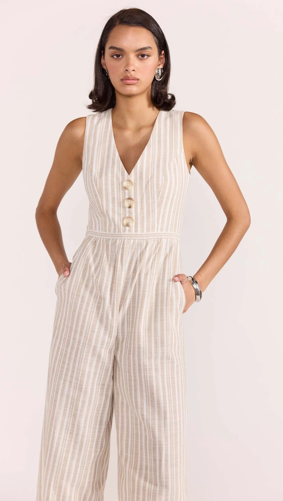 Embrace those warmer months with this on trend striped peace, the Edra Jumpsuit. A jumpsuit is an easy win, not only is it super comfortable its also stylish and practical for those busy days making it an effortless choice. Style with chunky slides or sandals, jewellery and your favourite neutral toned sunglasses to complete the look.