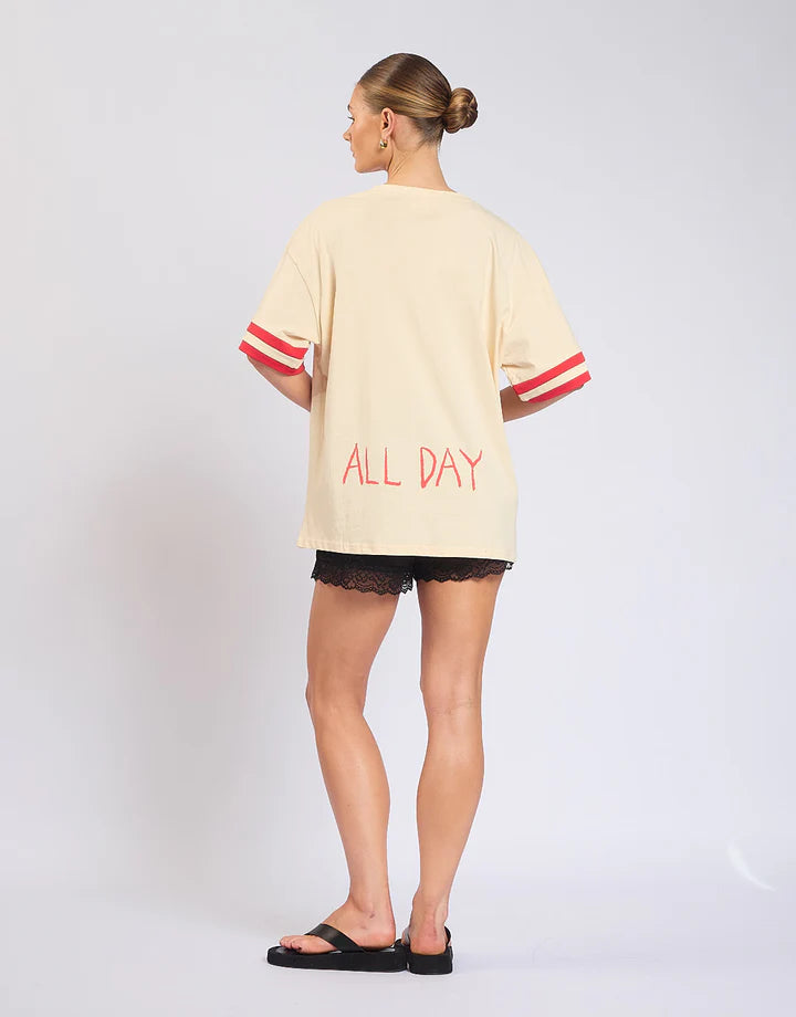 Easy, playful, and made for weekends — the Rosè All Day Tee is your go-to for relaxed styling with a touch of fun.
With its soft cream base, this tee is elevated by ribbed sleeve details that add structure, while the statement front and back prints bring personality from every angle. Designed in a relaxed fit, it’s the perfect throw-on-and-go piece that still feels effortlessly put together.