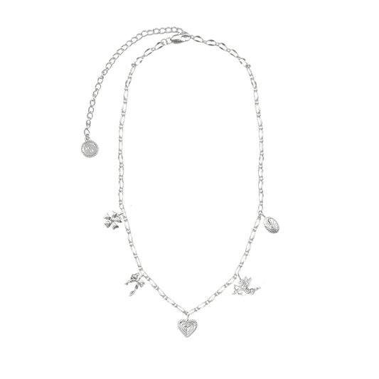 Hello Angel! Introducing the prettiest, most delicate necklace of the collection. The romantic and charming Angel Necklace is bound to steal your heart with its nostalgic, feminine touches featuring a few of our favourite motifs... the flower, bow, heart, cupid and locket, exquisitely strung on an iridescent chain. She is soft yet striking and will have your style float from day to night with ease. So go ahead, indulge in a little romance and charm with this darling necklace.