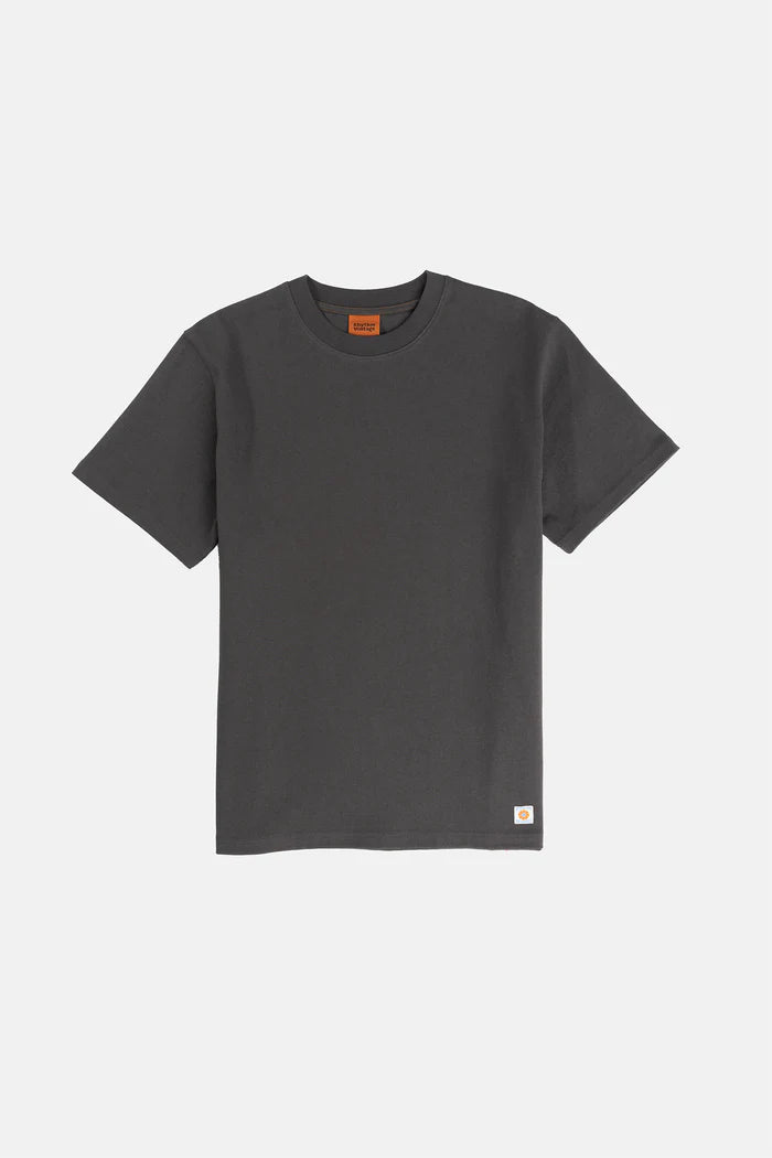 The Assembly Vintage SS T-Shirt in Stone Blue offers a refined take on a classic tee. Featuring a woven label on the lower left front panel, this piece combines premium construction with a soft, lived-in finish.