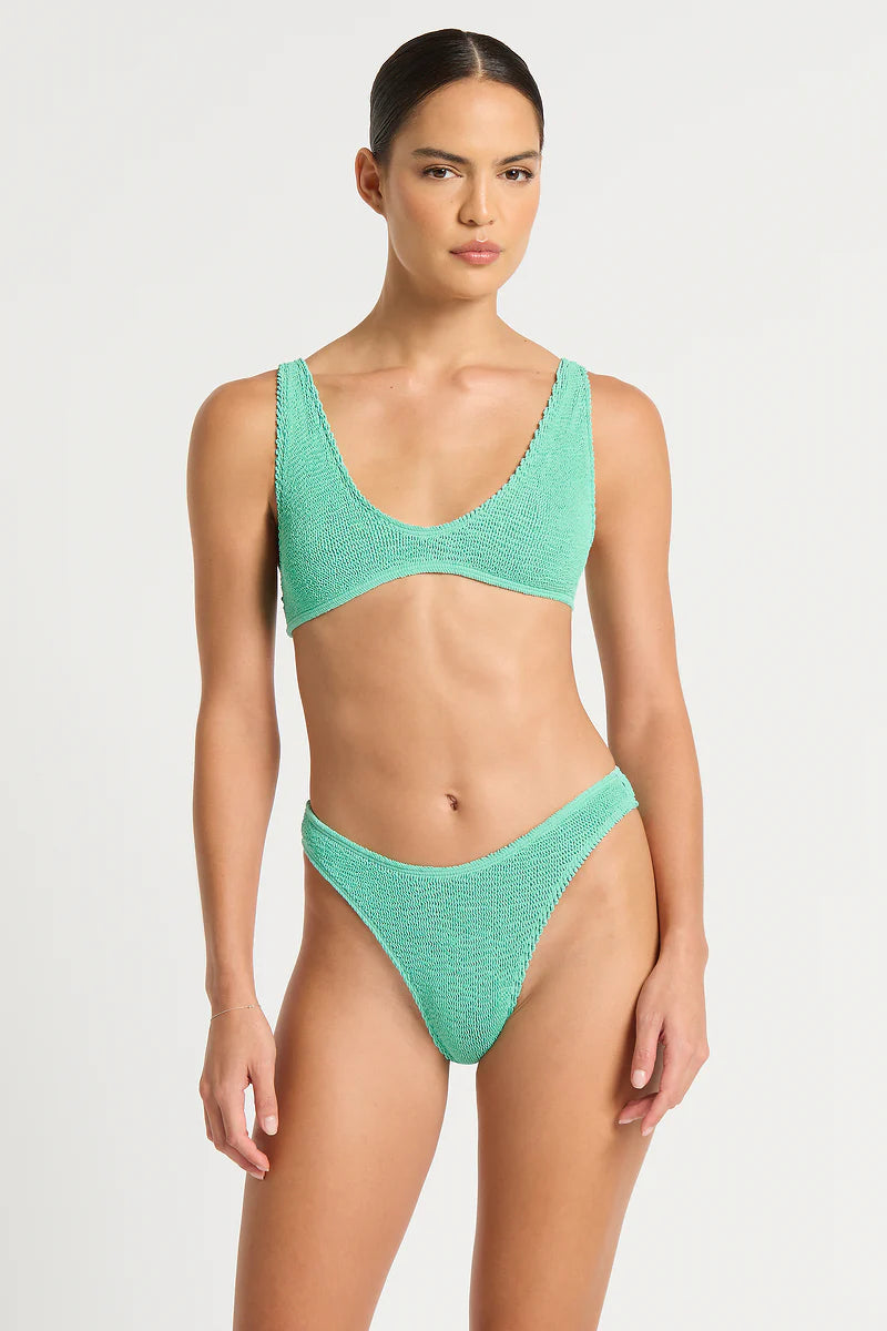 The Scout is our must-have crop. Featuring a scoop plunge neckline and a low back, this style medium to full bust support thanks to its wide shoulder straps. Handmade + designed in Sydney from The Authentic Crinkle™.
