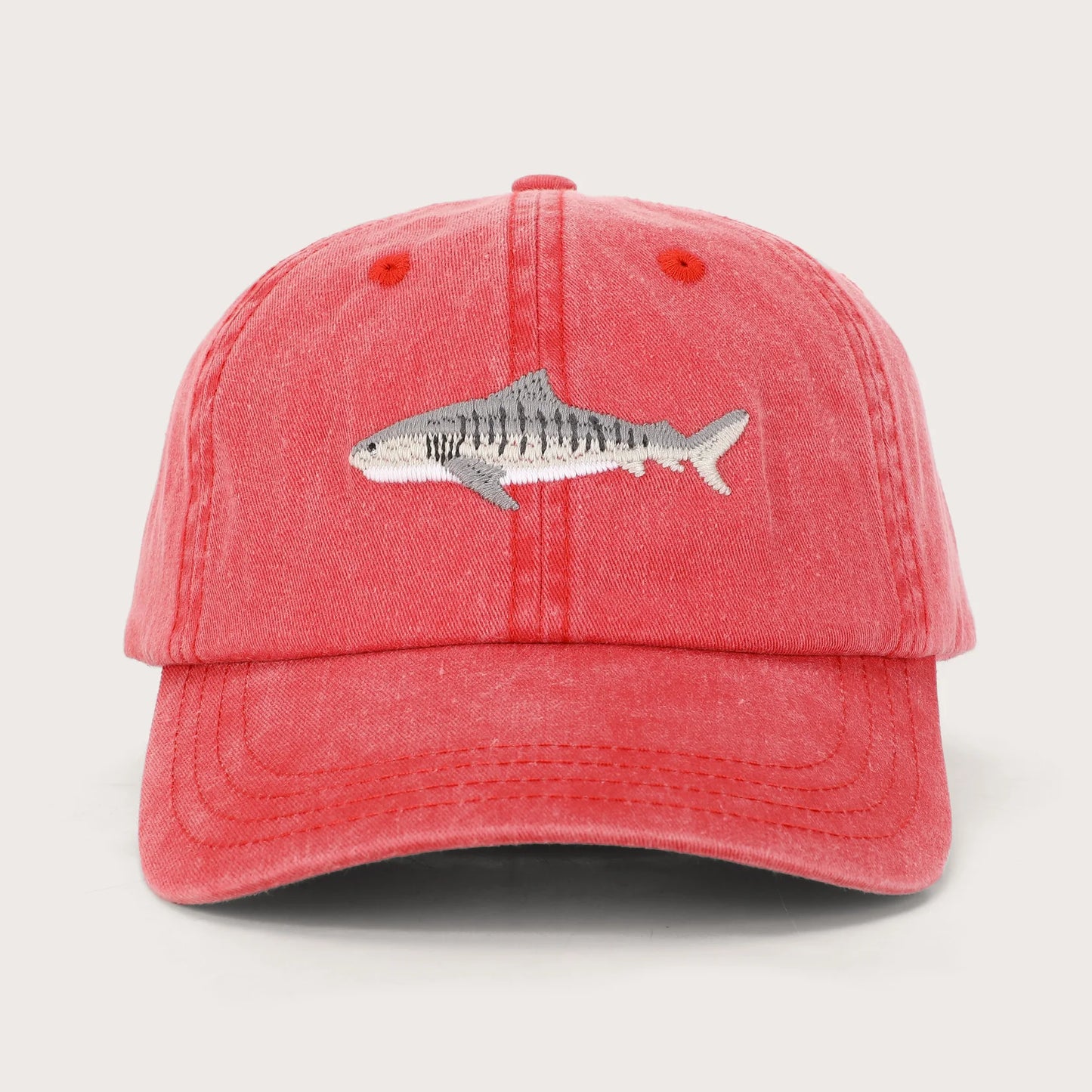 The Tiger Shark, on a retro faded red, has joined our Conservation Range. Made from the familiar soft washed cotton you already love, this exclusive embroidered design embodies the spirit of this iconic marine predator.
