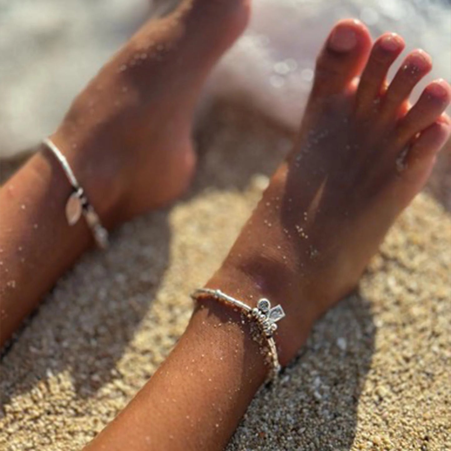 Introducing the Castaway Bracelet, a whimsical piece that embodies the spirit of carefree adventures and the enchantment of the ocean. Handcrafted with Hilltribe Silver, this bracelet features delightful details including a charming little fish charm, a radiant sun charm, and a playful bubble charm. Adorn your wrist with the Castaway Bracelet from Embella and let it transport you to a world of seaside bliss and wanderlust.