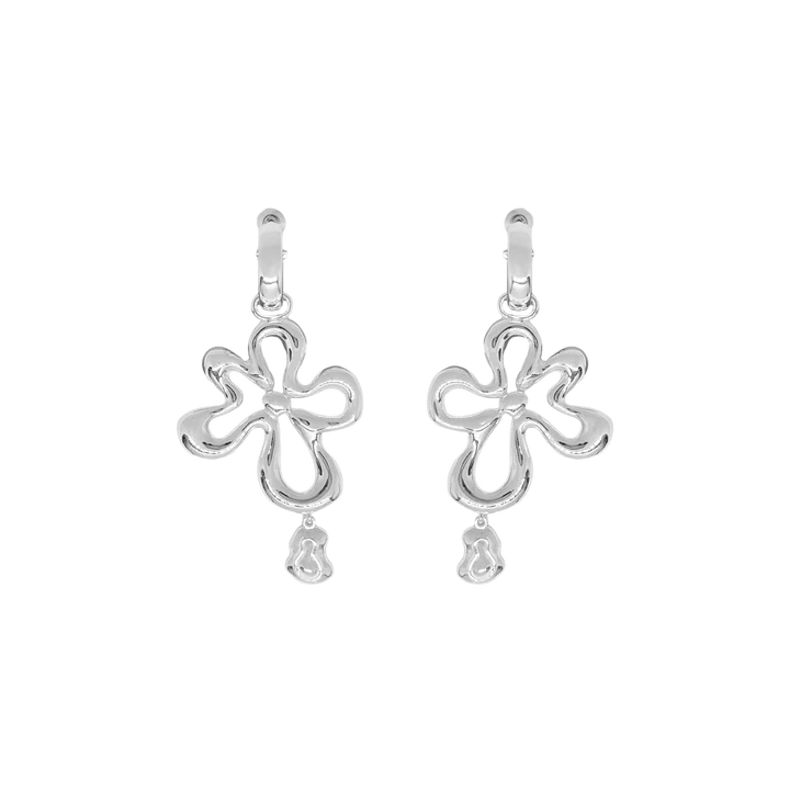 The DAHLIA Earrings in Silver evoke the playful side of nature’s elements, the ebbs and flows in water, the beautiful veining in untouched stone, the scalloping shores of the sea sides. The Dahlia boast a chic fluid motif suspended from a perfect and easy to wear mini hoop in a high polish finish. Sized to perfection suitable from day to night, these beauties are sure to become the favourites of the Ambrosia collection. Pair with the Maeve Necklace to create a gorgeous matching set.