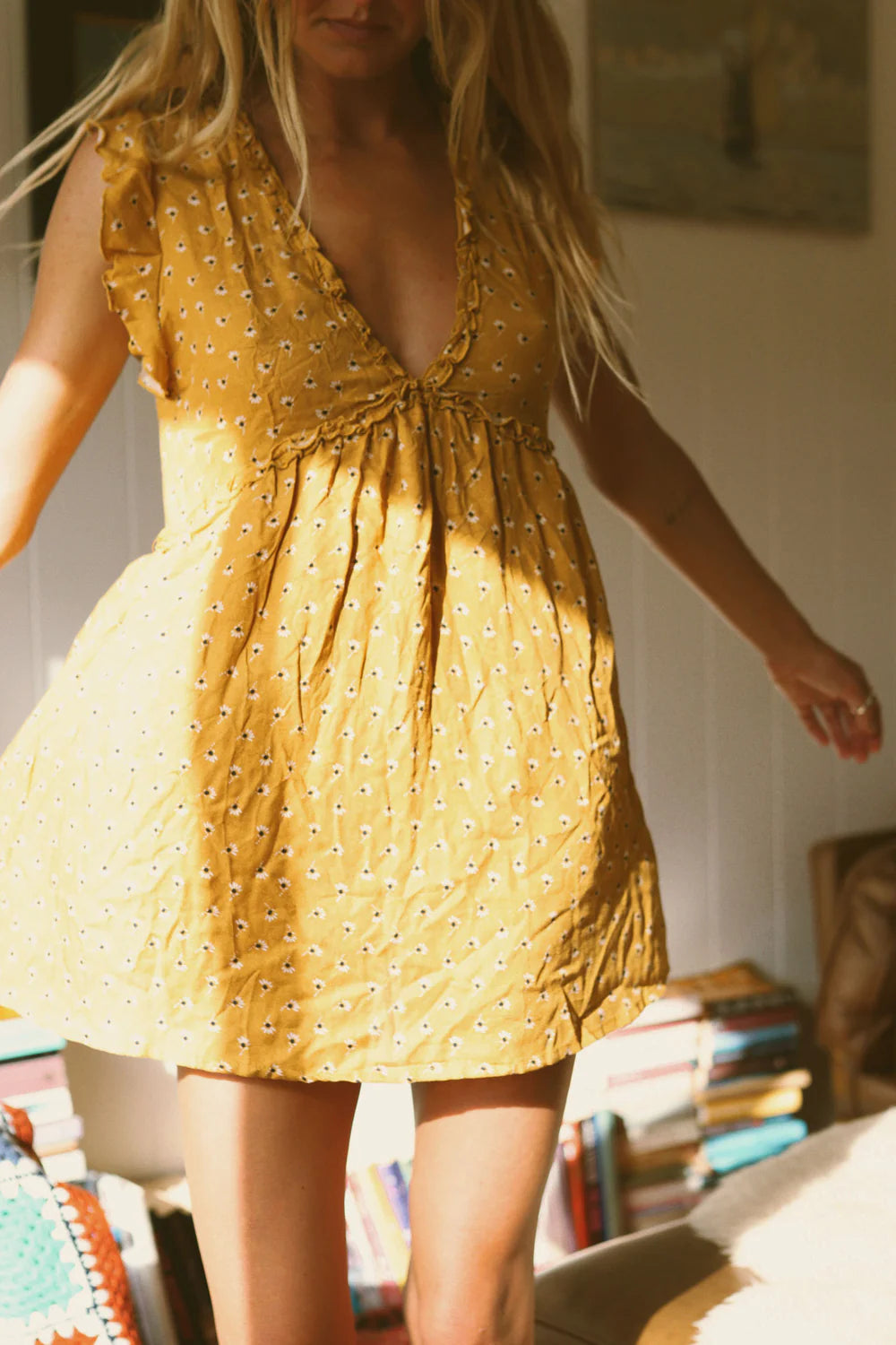 Enhance your wardrobe with the Brielle mini dress in saffron by barefoot blonde. This dress combines expert design and quality materials to provide you with a stylish and comfortable piece.
