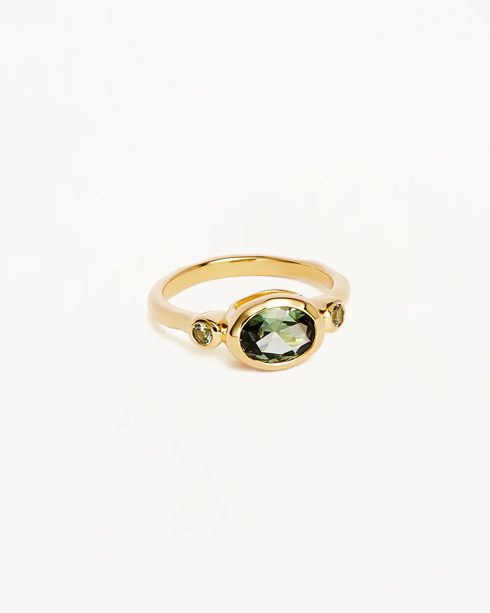 Bring harmony to your soul in the statement 18k Gold Vermeil Radiant Soul Ring - Tourmaline. This radiant ring features a synthetic green tourmaline, calling upon the power of its natural counterpart to bring balance and stability. Set with a trio of synthetic tourmaline stones, this gemstone ring is the perfect bold addition to your ring stack.