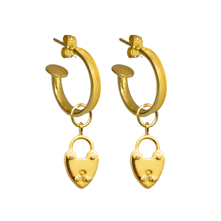Our bestselling Heart Mini Hoops are a little earring moment that our MM Women absolutely adore! We all love a baby hoop and these goldies are no exception. They easily dress up any outfit, especially with the addition of our gorgeous charms, or they are perfect on their own if you choose to slide the charms off. To be honest, we have been known to wear these for most occasions, including walking the dog and going to pilates. They really are your everyday earring bestie!