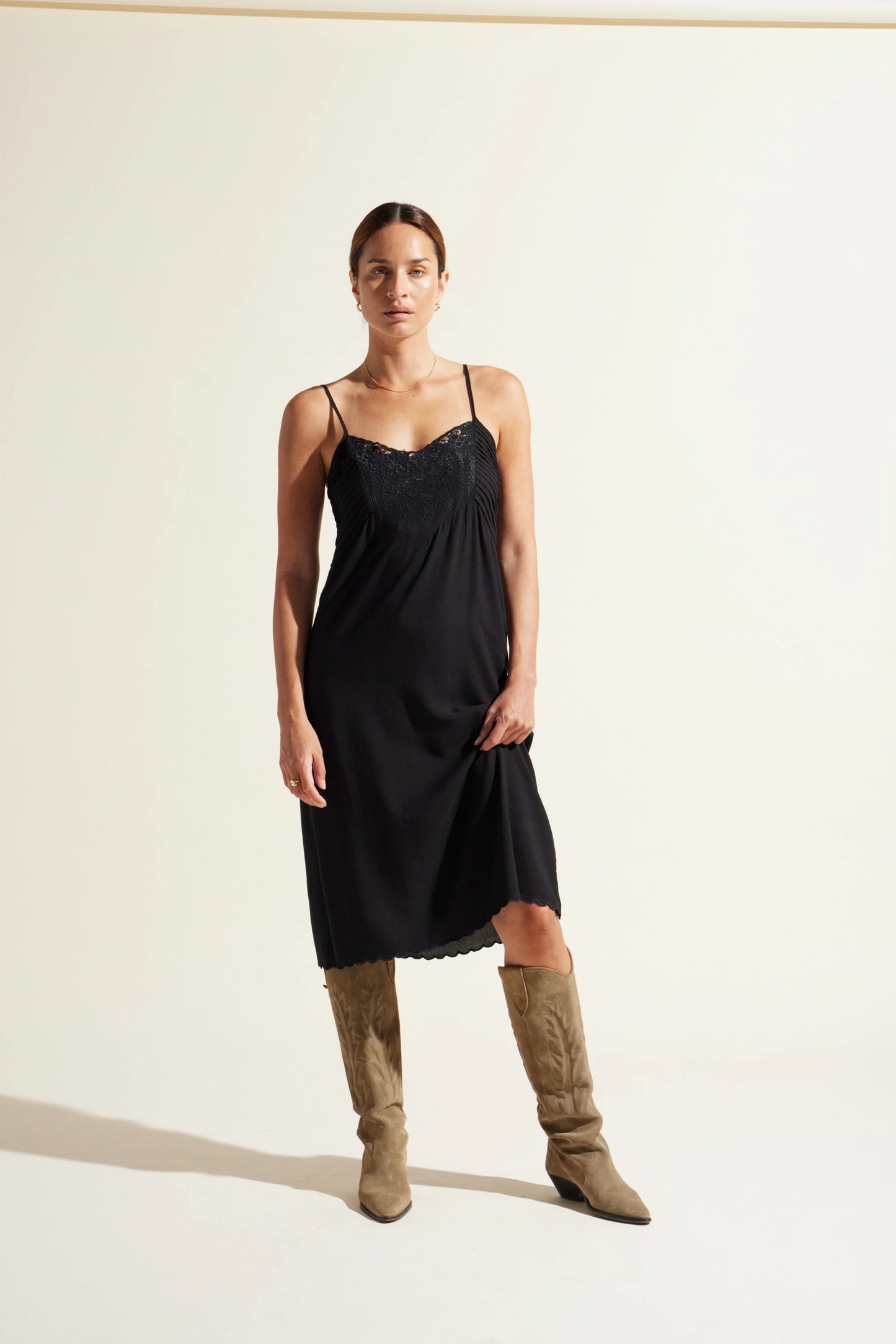 An easy to wear throw on midi dress versatile for day or night.