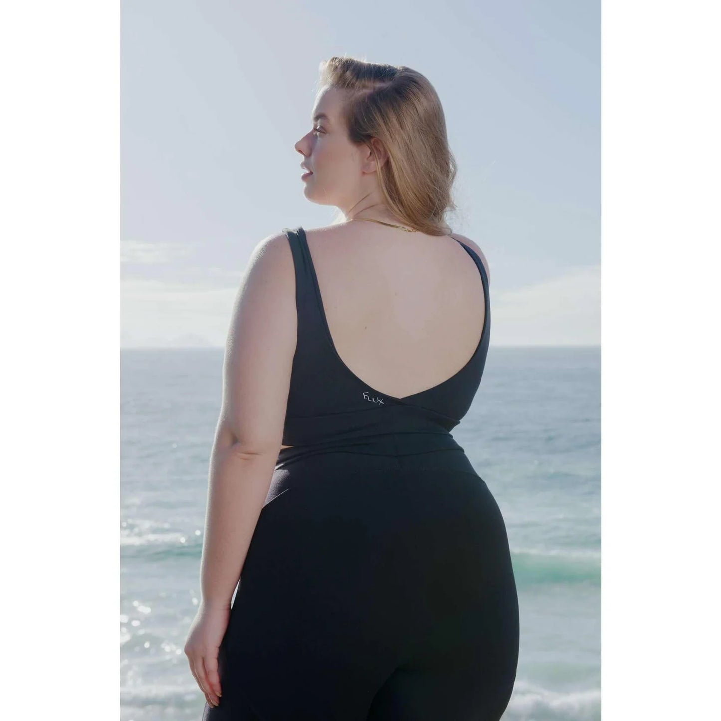F.LUX Bruna sports bra. With a sexy v at the back and the cross over fabric with front, this is the most versatile activewear top on the market.