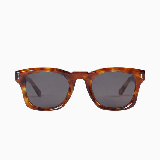 An easy-wearing sunglasses style featuring an 8mm thick, flat-face and iconic nose bridge. With metal highlights and bevelled details, the Solomon is the perfect unisex sunglasses frame for all occasions.