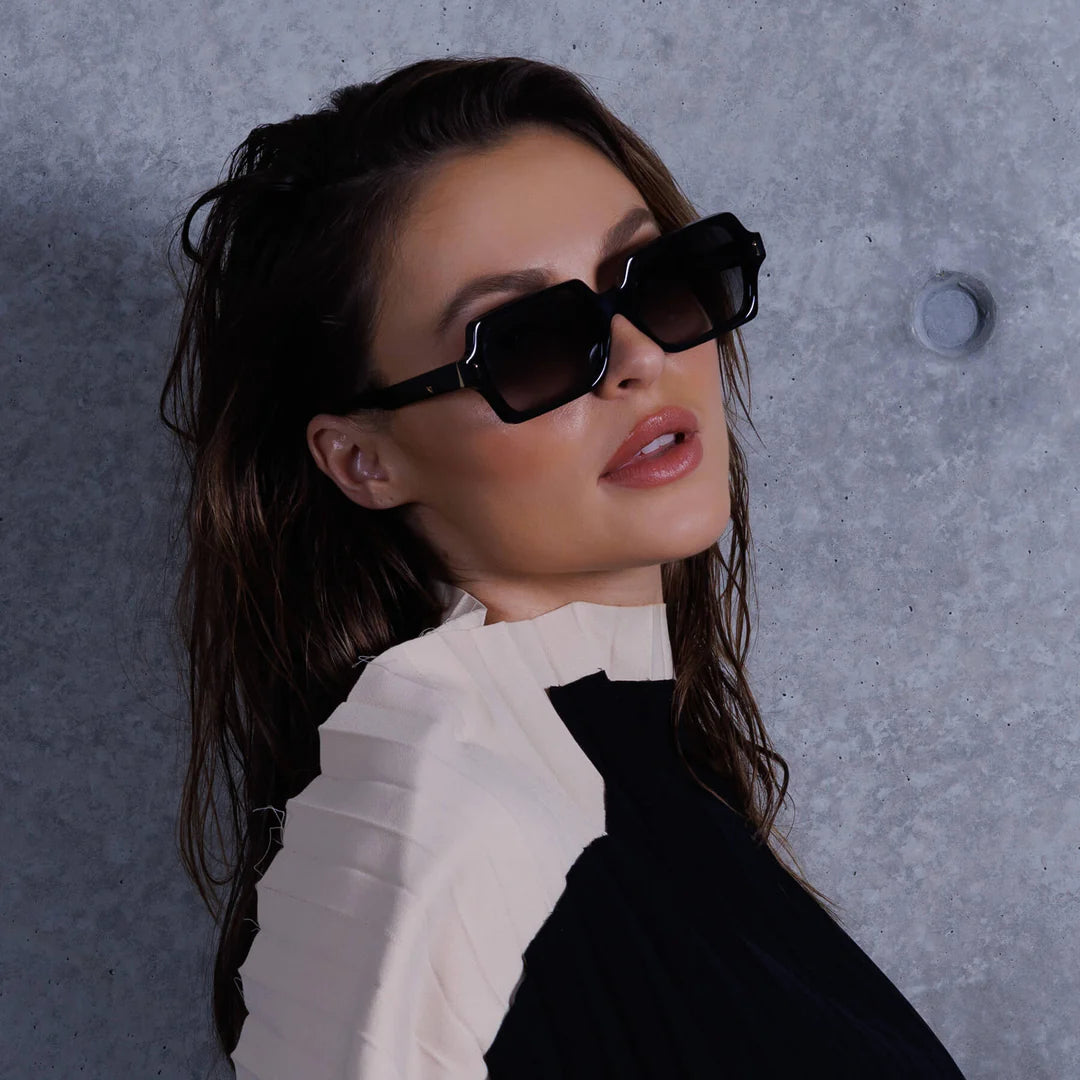 Liberty - A mid-sized, versatile frame with metal trim and a thick, flat face.