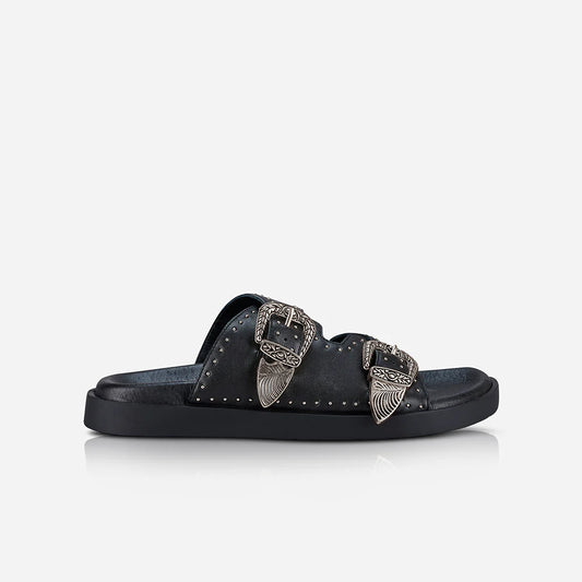 The bestselling Eastwood slide with it’s signature heavy buckles and stud hardware details is updated with an newly shaped leather footbed sole. 
