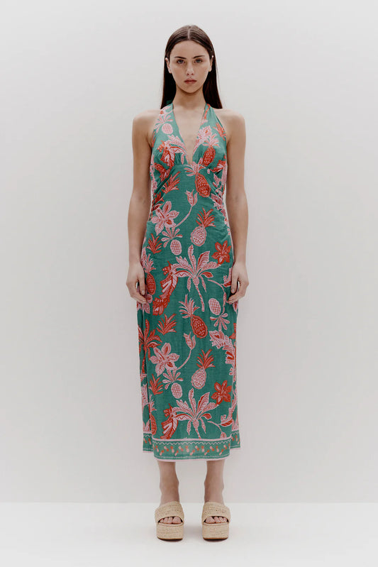 The Kara Midi dress by Ownley is a halterneck dress with adjustable ties. Fabricated with our Pineapple Print in a Cotton/Linen blend, the Kara is fully lined for easy wear.