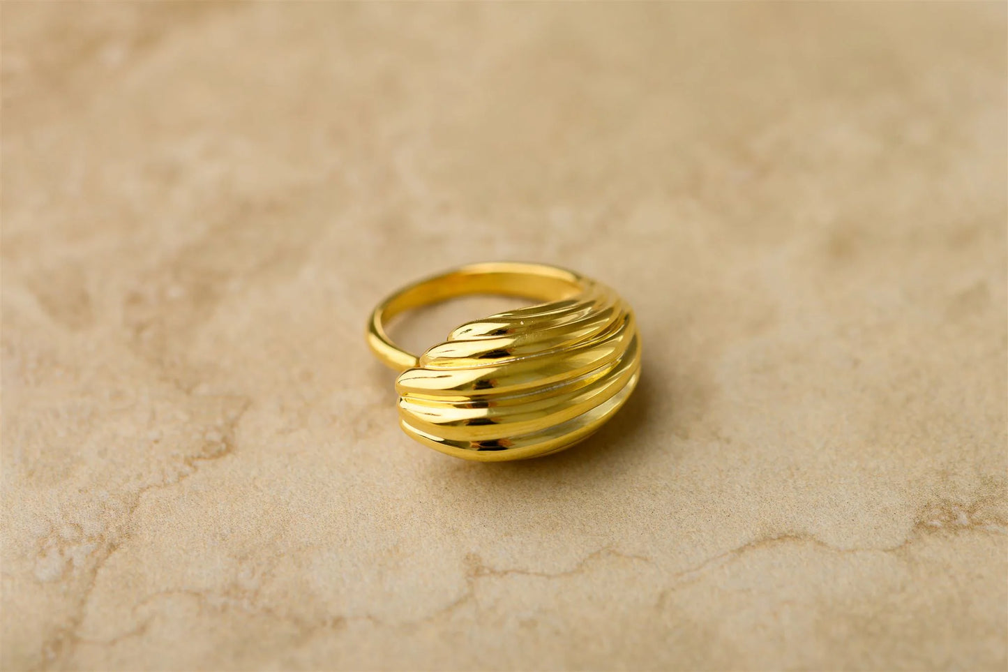 Unleash your bold and playful side with the Elodie Ring. This statement ring features a unique textured design and a curved shape, making it a fun and eye-catching addition to any outfit. Elevate your style game with the Elodie Ring. Pair it with the Elodie earrings.
925 Gold Plated Sterling Silver
Lead,Nickel & Tarnish Free
Hypoallergenic
Waterproof