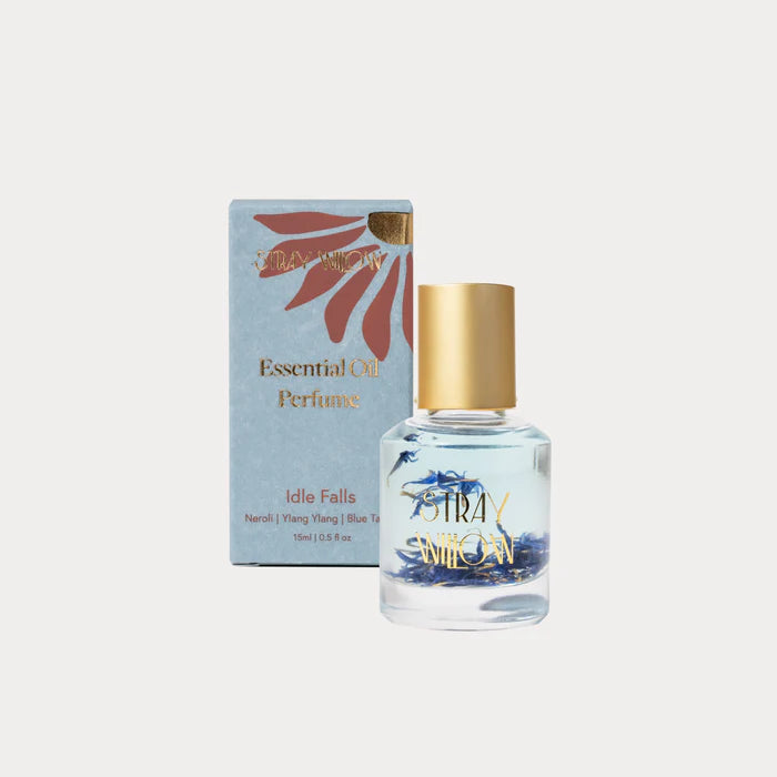 Idle Falls is an Australian-made natural perfume roller created to bring a sense of tranquility and calm. This serene aromatherapy blend features uplifting Grapefruit and Bergamot, floral notes of Ylang Ylang and Neroli, and the soothing presence of Blue Tansy and soft Vanilla. Housed in a sustainable recyclable glass roller bottle, it's crafted with natural botanical ingredients and pure essential oils—offering a gentle, grounding scent to support mindful self-care moments, clarity, and emotional ease. The