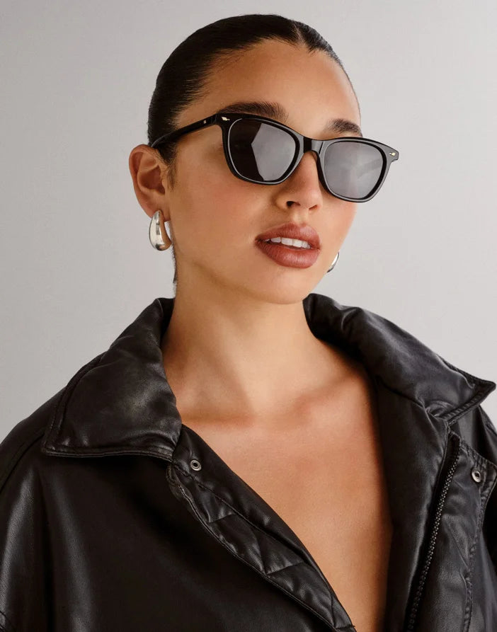 Offering a classic vintage aesthetic, these Le Specs Nonsensical Black Sunglasses are a mid-size unisex frame suited to most face shapes. Designed with subtle flagstripe rivets and vintage inspired temple shape, this style provides timeless appeal.
• Black frame with dark grey glasses
• Lightweight, durable and impact resistand polycarbonate frame
• Shatterproof and scratch resistant polycarbonate lenses
• D-frame
• Frame material: RA30 70% Recycled Acrylic
• UV protection: Category 3