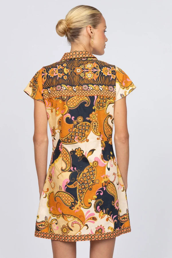 Our best selling Cindy Mini Dress is back, in the statement Cocoa colourway. Designed for lovers of mod style - this fun mini shift has a slightly structured a-line shape, collar and brass zip with hoop detail to set it off. Inspired by the disco era, the Cindy brings a nostalgic '60s vibe that’s pure magic. 