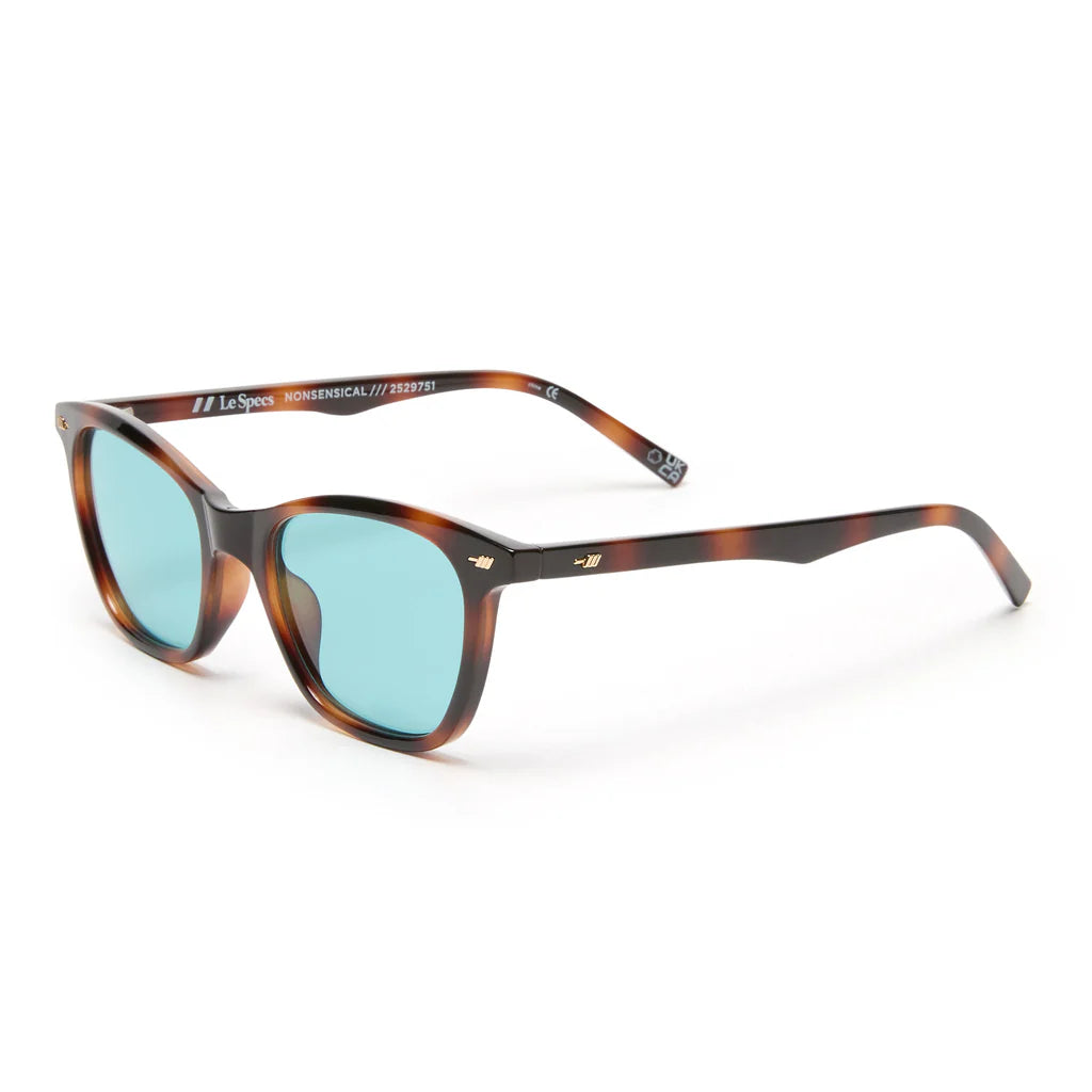 Offering a classic vintage aesthetic, our NONSENSICAL sunglasses are a mid size unisex frame suited to most face shapes. Designed with subtle flagstripe rivets and vintage inspired temple shape, this style provides timeless appeal.
• Finished in a dark tortoisehell frame with mid tone blue lenses.
• A lightweight, durable and impact resistant frame.
• Fitted with shatterproof and scratch resistant polycarbonate lenses.
