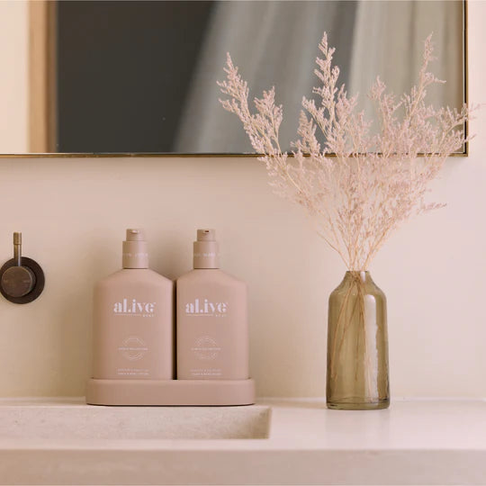 al.ive body - A 500ml Hand & Body Wash and 500ml Hand & Body Lotion housed in interlocking bottles that sit neatly within a matching tray. Presented in the Nude colourway in our sweet Apricot & Sweet Fig scent, a warm blend of ripe fruit and vanilla.
