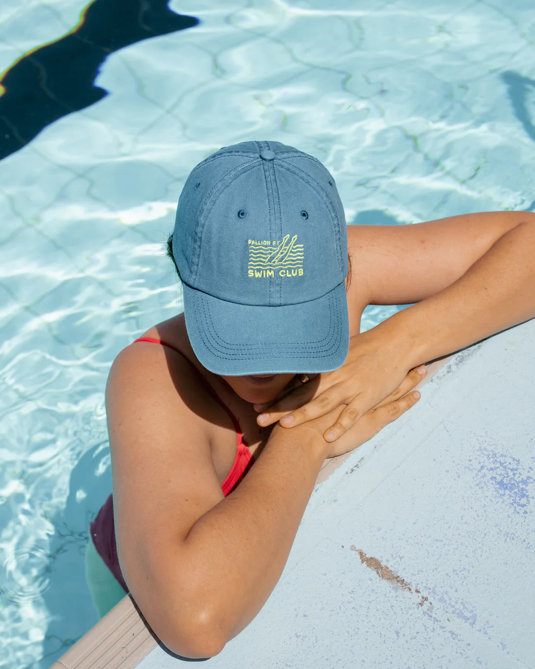 Pallion Point - Introducing our new Lifestyle Lids, a fish-free celebration of Australia's love for the ocean. The Swim Club Lid is inspired by early mornings at your local ocean pool - towel over the shoulder, goggles in hand. Crafted from soft cotton with a washed blue tone, this hat is your new staple for post-swim chats on sun-warmed steps. Made for anyone who believes a morning dip can fix just about anything. For those who dive in, come up smiling, and start the day salty. 