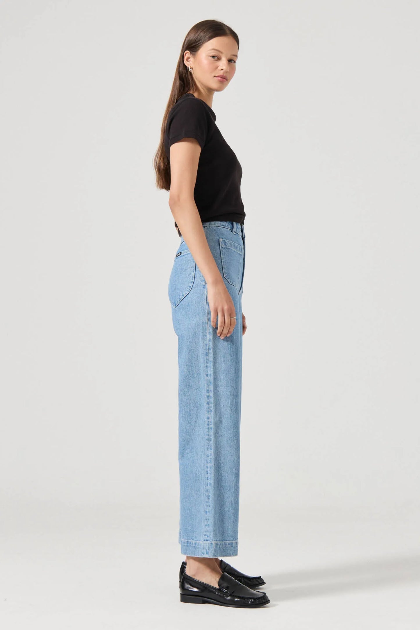 The Sailor Jean:
High rise, slim fit with a sailor wide leg
Fits smaller in the waist to eliminate gaps at the back waistband
Features Rolla's signature back pockets & sailor style patch front pockets
Specially angled and shaped in the back for a truly peachy looking butt
Ankle length, also available in a long length
Zip closure
Made with vintage gold toned hardware