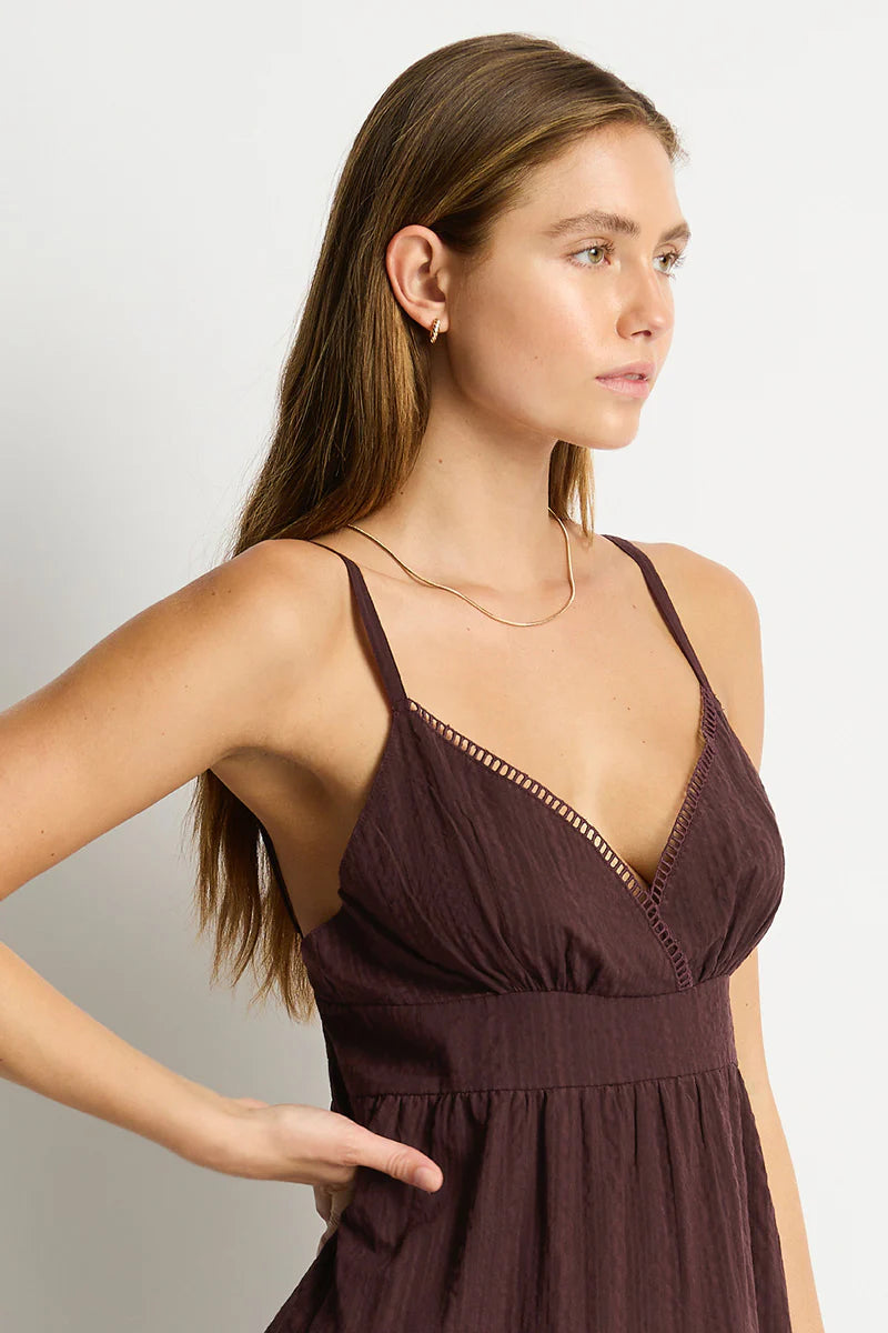 Introducing Ripples, our refined resort‑wear essentials. Designed for effortless packing, versatile styling, and layering over your swim for an elevated resort look.
Seersucker stripe texture
Sheer coverage
Shirred back panel
Ladder lace trim detail
Adjustable thin straps
Short length
Fabric Composition:
100% Cotton