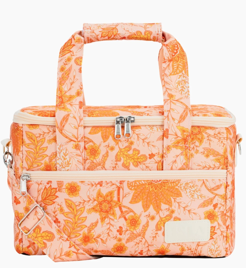 The Del Sol small cooler bag features sunlit oranges and golden yellows against a soft apricot backdrop. With insulated lining and a wipe-clean interior, Del Sol is designed to be both functional and a cheerful companion for family picnics, beach days and sunset trips.
- Premium and durable recycled polyester fabric made from plastic bottles
- W30 x D20 x H20cm (12L)
- Insulated internal lining
- Seek sun protection with a matching beach cabana or&