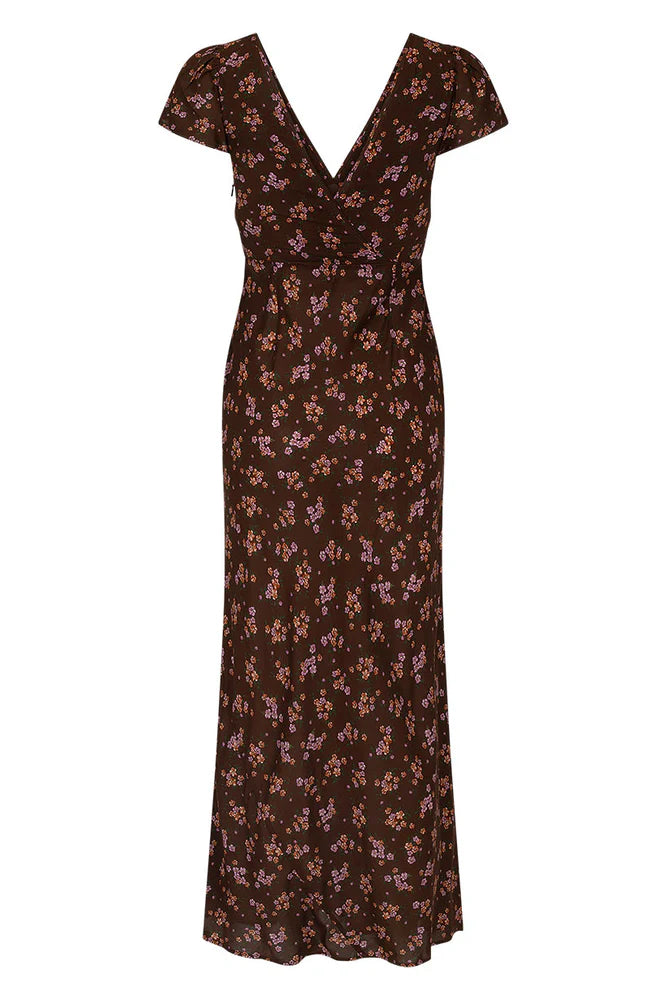 Our Melody Bias Maxi Dress in Antique Walnut is crafted for the heartbreakers. An exquisite showstopper, our dress is cut to flatter the waist and glide over the hips accentuating your silhouette. Soft pink ditsy florals ramble across a backdrop of deep chocolate brown, flutter sleeves float sweetly at the shoulder and the V neckline and low V back adds a sensual touch. Pair with mules and fine jewels for date night or with combat boots and a slouch bag for something a little more rock and roll.