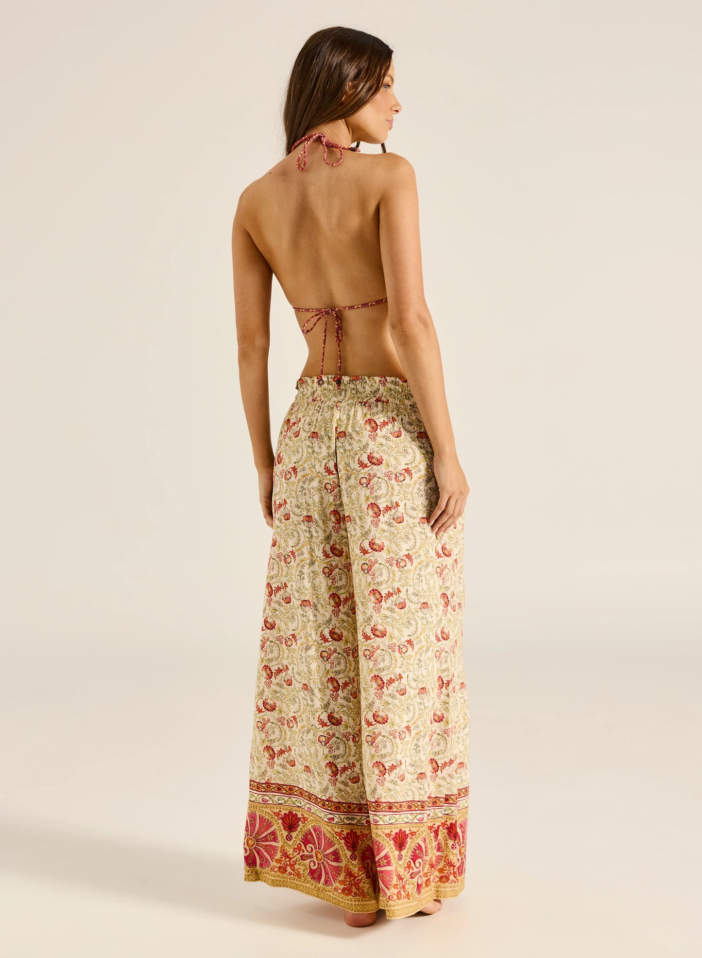 Step into style with the Valentina Pant, a wide-leg palazzo design featuring a charming ruffle edge and a drawstring finish. With convenient side slash pockets, these versatile pants can be worn as a statement style or as luxe over-swim.
Product Details:
Wide leg palazzo pant
Elastic waistband with ruffle edge
Drawstring finish
Side slash pockets
Wear as a pant or over swim
Full length