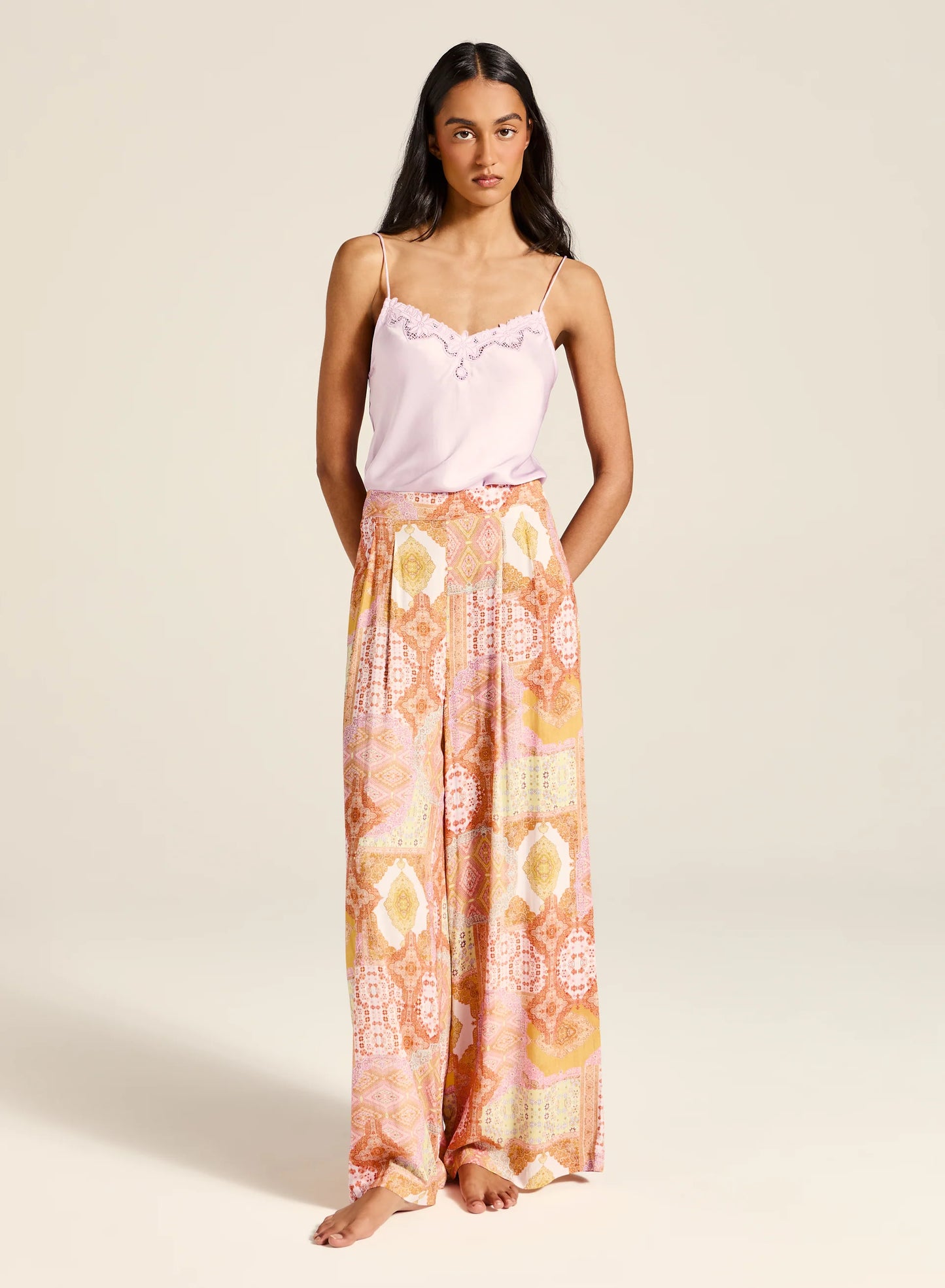 A relaxed fit wide leg pant, with a fitted waistband and gathered elastic panel in the back. Finished with an invisible zip for the perfect fit.
Product Details:
Fixed waistband with comfort elastic panel at back
Invisible zip with hook and eye at back
Wide leg
Pleats at front
Full length
Side pockets