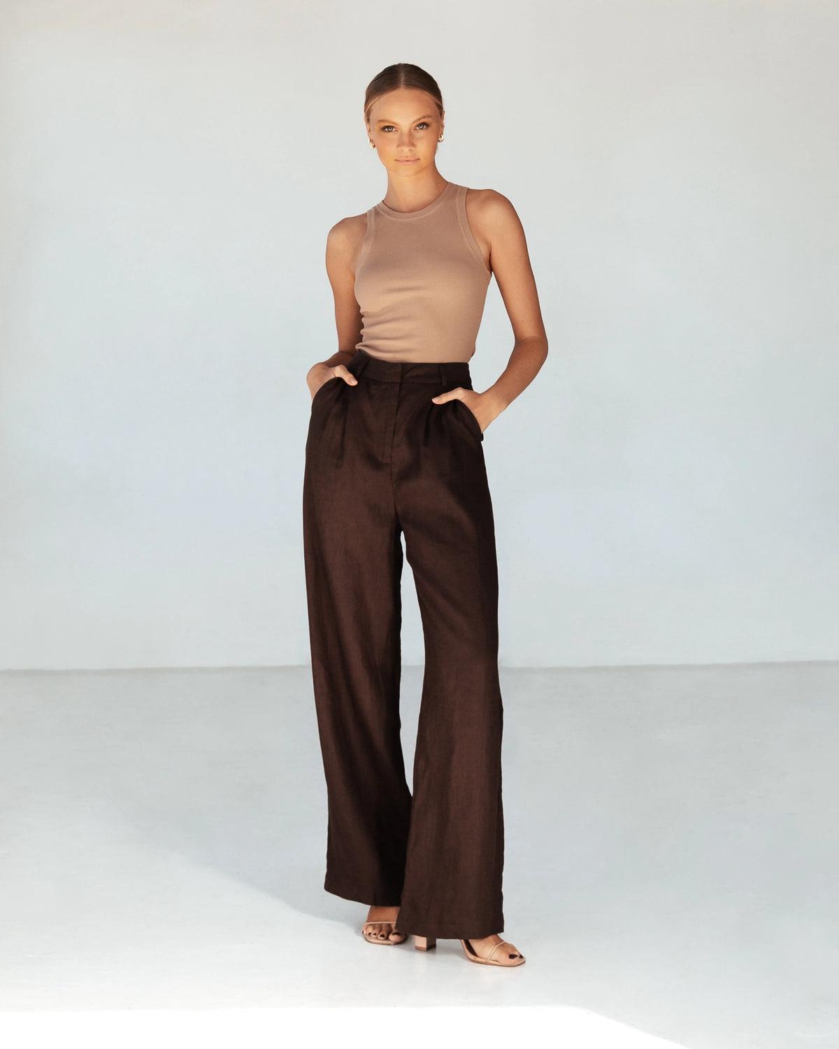 Effortless flow. Elevated comfort.
The Castaway Pants are designed with a high-rise waist and a wide-leg silhouette, offering a relaxed yet refined fit. Crafted from lightweight, breathable fabric, they drape beautifully for all-day ease. Perfectly tailored with side pockets and a flattering length, these pants transition seamlessly from casual days to polished evenings.