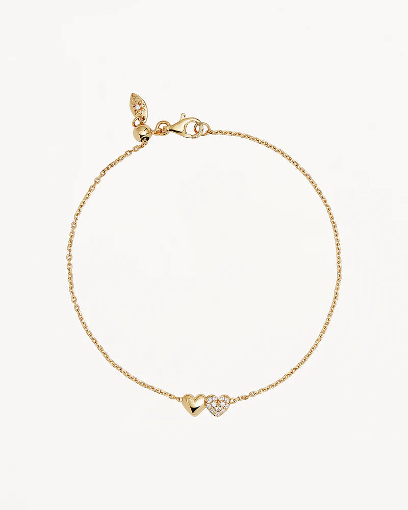 Express your unwavering love with the Always By Your Side Bracelet. This delicate piece symbolises the promise of being forever connected to those you cherish. Available in 18k gold vermeil. 