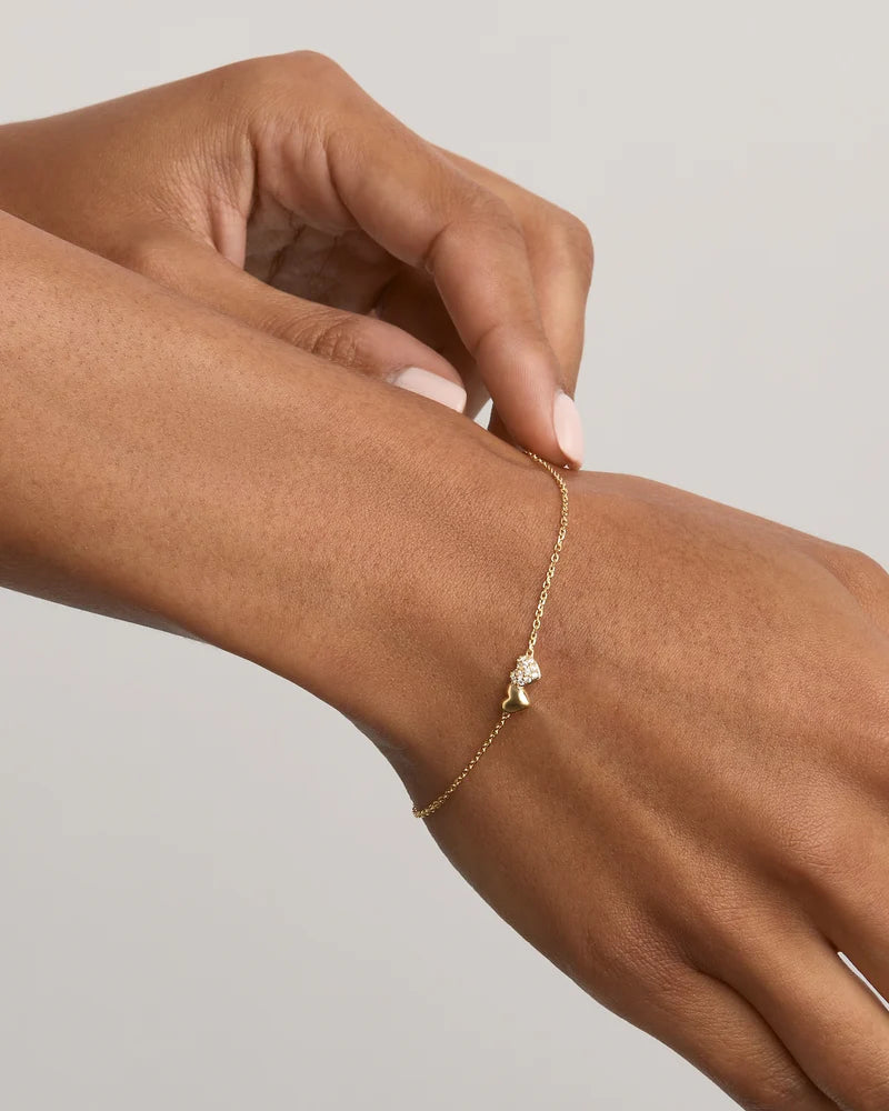 Express your unwavering love with the Always By Your Side Bracelet. This delicate piece symbolises the promise of being forever connected to those you cherish. Available in 18k gold vermeil. 