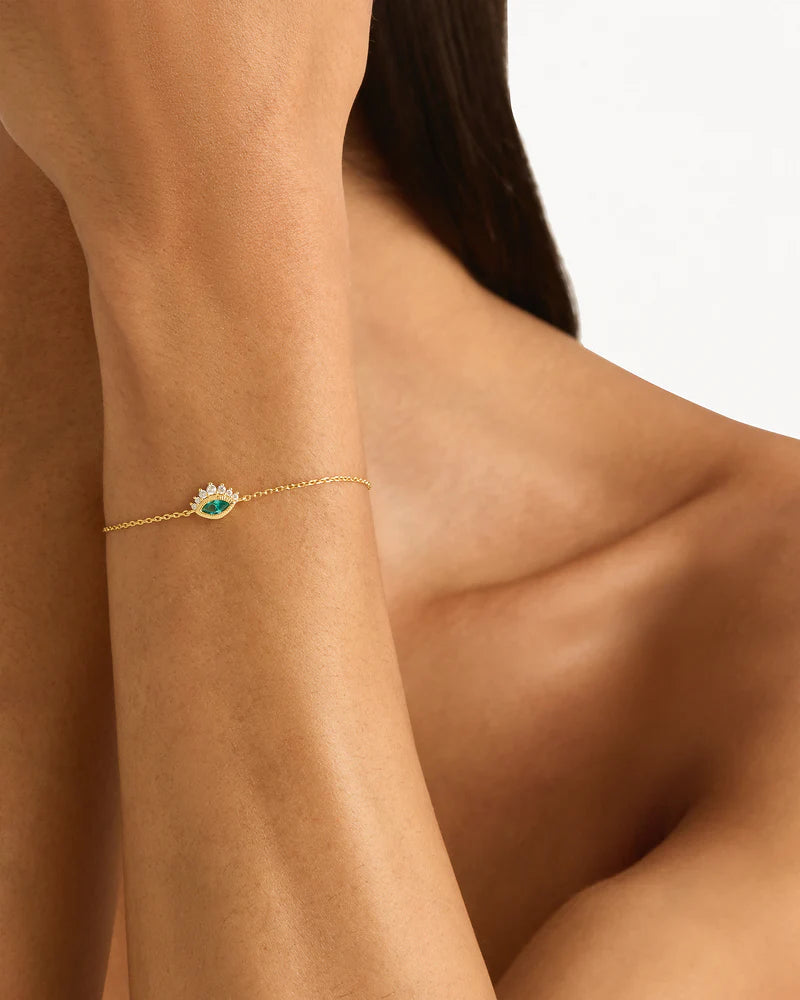 Breathe new life into the new year with the Hope and Protection Bracelet. Set with lab-grown blue Paraiba marquise-cut gemstone, our luminous evil eye will assist you in shedding all that does not serve you, allowing you to move into the new year with purpose and peace. This keepsake is perfect for gifting, traditionally gifted to imbue the wearer with luck and protection. 