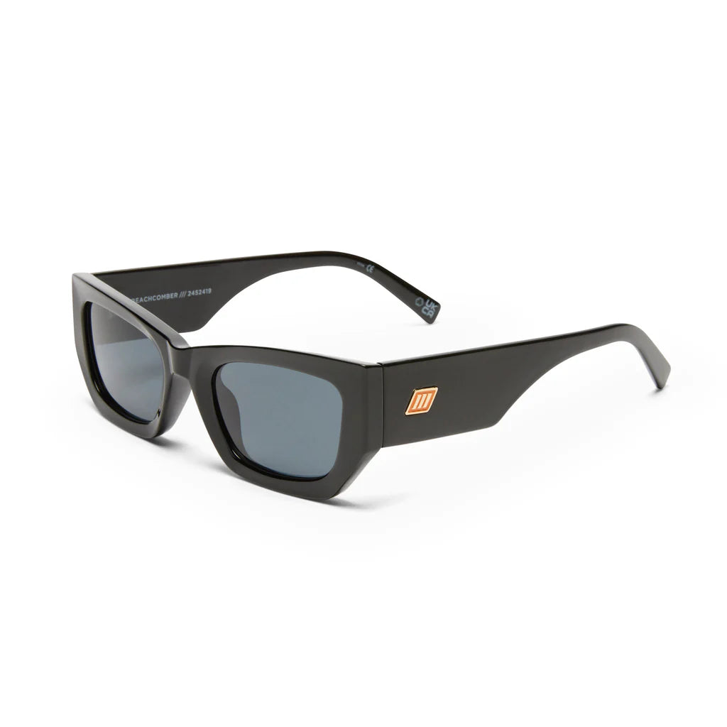 Timelessly elegant and sophisticated, our BEACHCOMBER sunglasses are an everyday staple. Featuring a low bridge fit, bold edges and bevelled lines, this frame is finished with a square flagstripe hardware with custom enamel fill to each temple.
• Finished in shiny black with bright gold hardware and dark tonal lenses for a sleek look.
• Made using BPA free polymer plastic which is lightweight, durable and impact resistant
• Fitted with shatterproof and scratch resistant polycarbonate lenses.