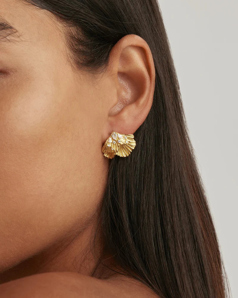 Our 18k Gold Plated Ocean Whisper Statement Earrings are reminiscent of the untouched beauty of the ocean in its quiet, soft moments. Our Ocean Whisper styles are visually ambiguous and beautifully nostalgic, taking on textures and shapes of magical things found beneath the sea. 