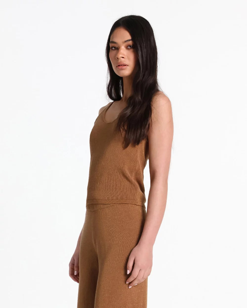 The Raya Knit Top by Lost in Lunar is your new summer essential! With a breezy, relaxed fit and a flattering rounded V-neckline, this semi-sheer knit top adds the perfect touch of effortless cool to any outfit. Light, breathable, and stylish—it's the perfect layer for those sunny days or laid-back evenings.