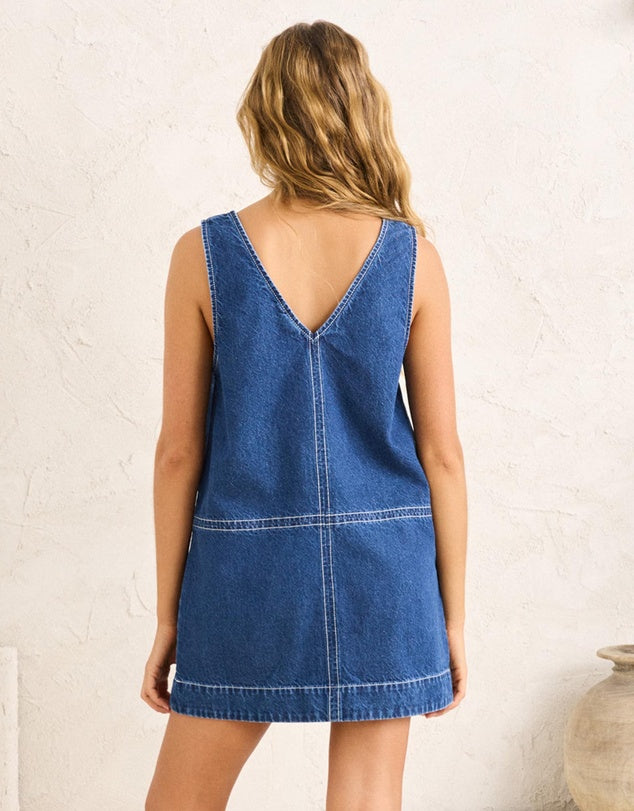 Effortlessly cool and endlessly wearable, the Cece Contrast Stitch Mini Dress is your new off-duty essential. Crafted from soft, mid-weight denim, this relaxed-fit mini is designed with a flattering V-neckline front and back and finished with bold contrast stitching for a modern, structured look.