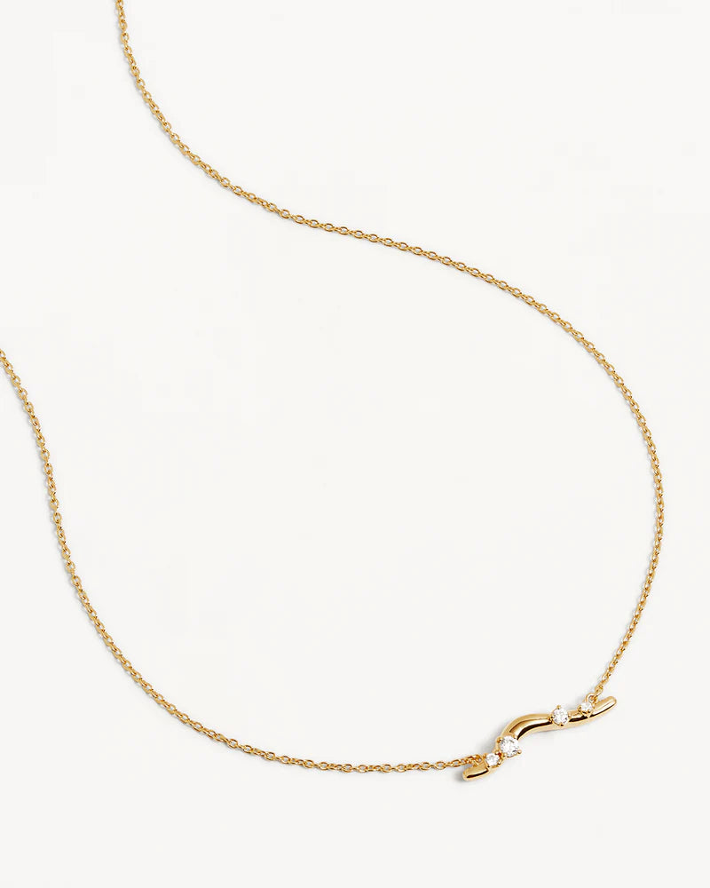 Our 18k Gold Vermeil Chasing Tides Necklace is inspired by the uninhibited soul-freeing euphoria of chasing tides and dancing with the waves. Featuring undulating and organic shapes inspired by ocean waves, this keepsake is perfect for everyday wear and layering. 