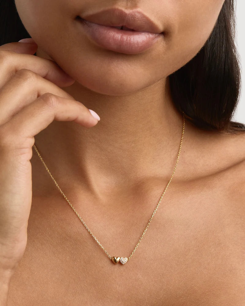 The Always By Your Side Necklace celebrates love and connection with a timeless design — perfectly crafted to symbolise a promise of togetherness, whether near or far. Available in 18k gold vermeil. 